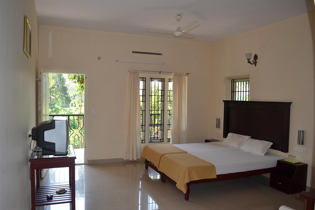 Kerala House Apartment Thekkady Bagian luar foto